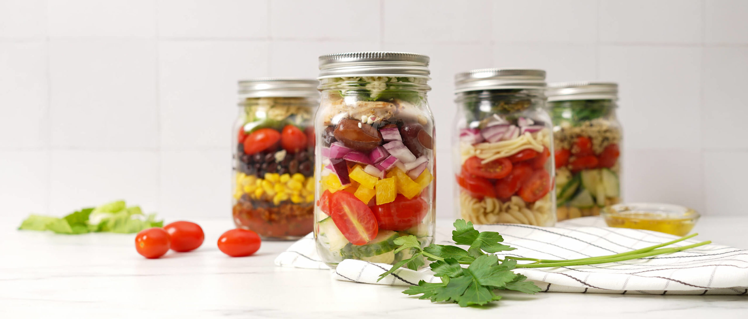 How To Make the Perfect Salad in a Jar + 4 Easy Recipe Ideas